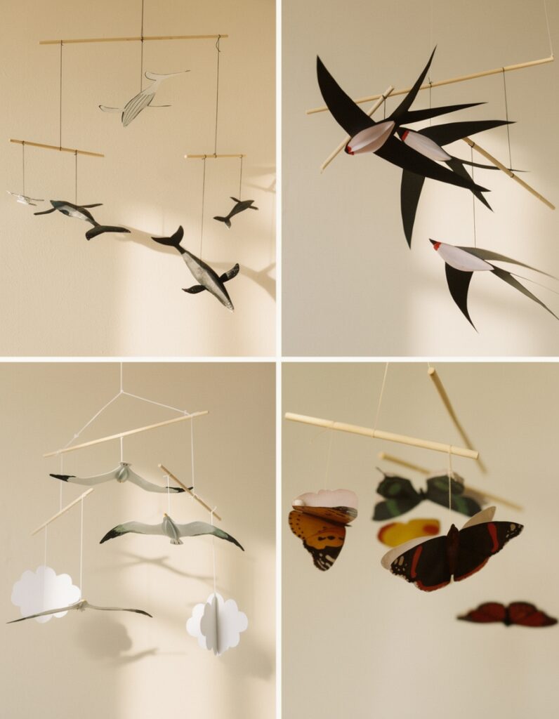 Montessori Animal Mobiles set including swallows, whales, seagulls and butterflies suspended for visual observation

